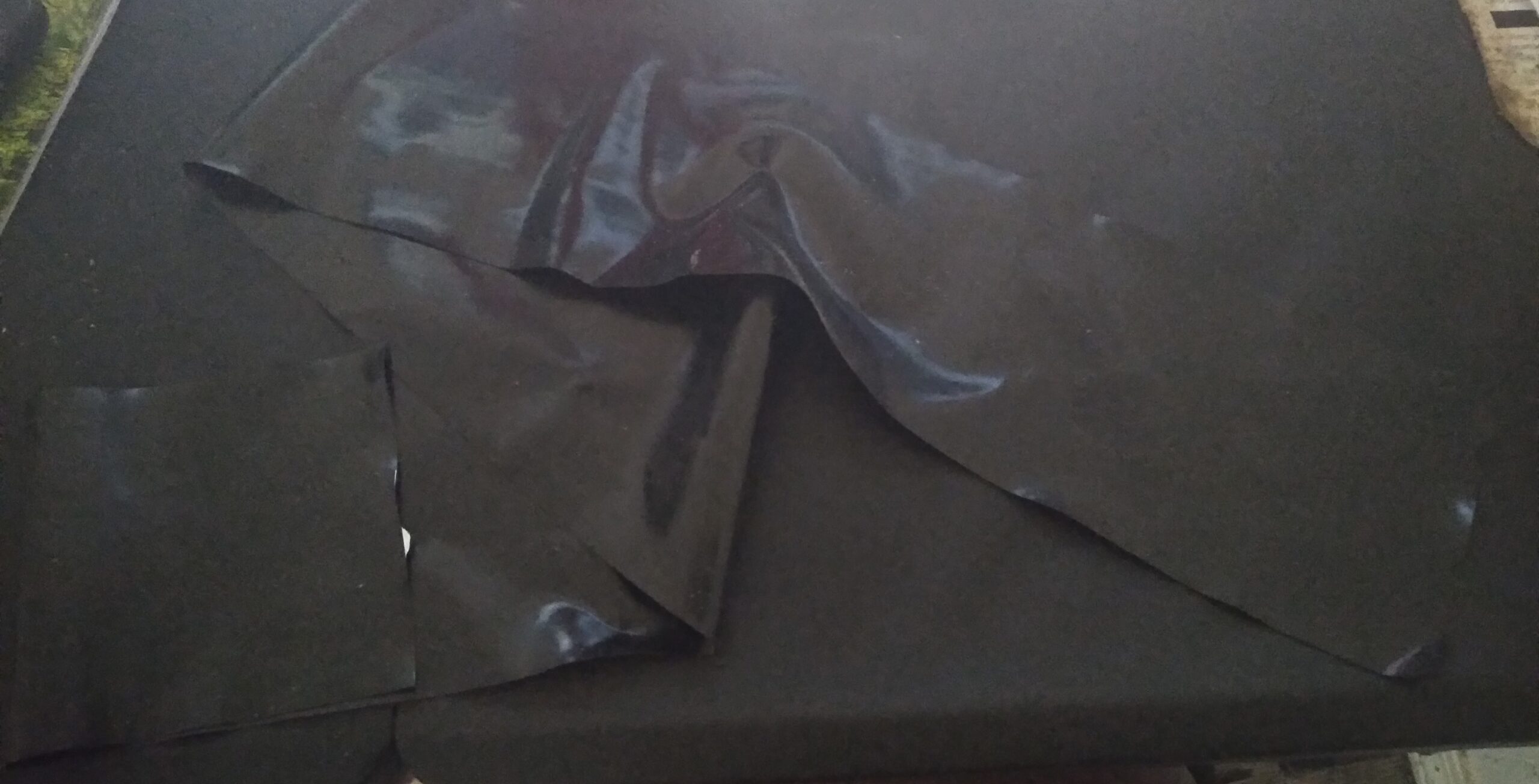 Black resistance band showing damage.